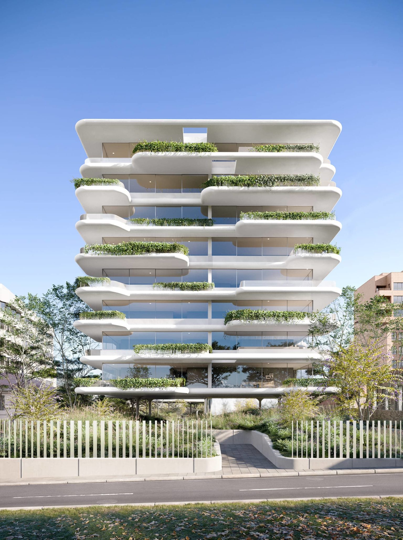 Exterior perspective rendering of a white residential building with green terraces/balconies; sunset mode frontal street view.