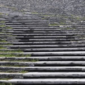 Exterior photography of hillside line steps; day mode frontal view.